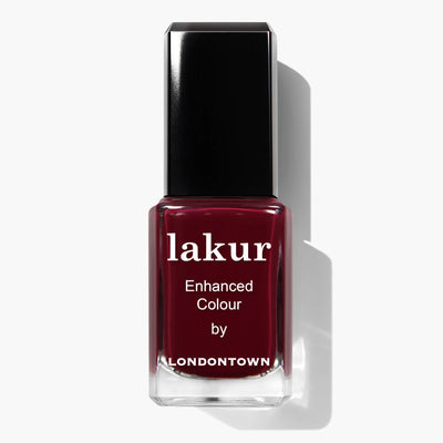 A bottle of Guarded Jewel (Professional) nail polish by LONDONTOWN in a deep maroon crème shade, labeled "Enhanced Colour." This vegan and cruelty-free nail polish offers a rich, sophisticated look.