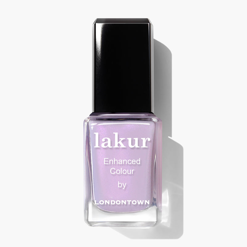 Bottle of Honey Lavender nail polish by LONDONTOWN in a magical lavender shade against a white background.
