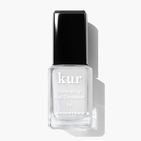 A bottle of LONDONTOWN Illuminating Nail Concealer, perfect for brightening dull nails and concealing discoloration, featuring a black cap on a white background.