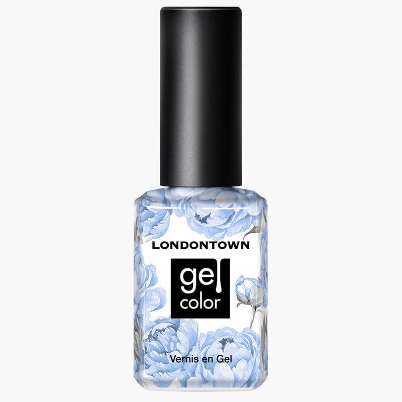 A transparent nail polish bottle with a black cap labeled "LONDONTOWN In the Clouds" and adorned with a blue floral design on the bottle. For flawless application, cure it under UV/LED light.