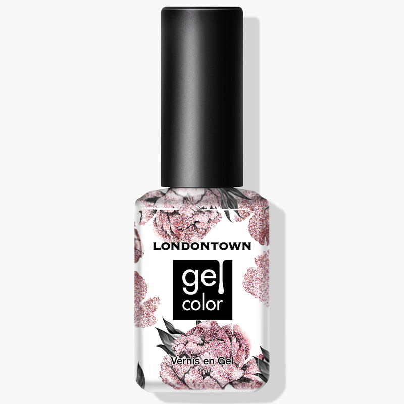 A bottle of LONDONTOWN's "Kissed by Rose Gold" gel color nail polish in a stunning metallic rose gold. The label features "LONDONTOWN gel color," floral designs, and text "Vernis en Gel" on a white background. Designed for use with UV/LED Gel Color systems, the cap is black.