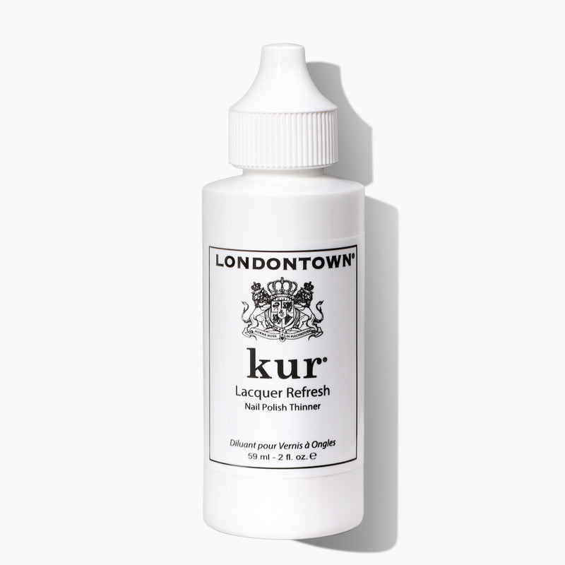 A white, 59 ml (2 fl. oz.) bottle of LONDONTOWN Lacquer Refresh Nail Polish Thinner with a white cap. Just a few drops bring your polish back to life, ensuring good-as-new polish every time.