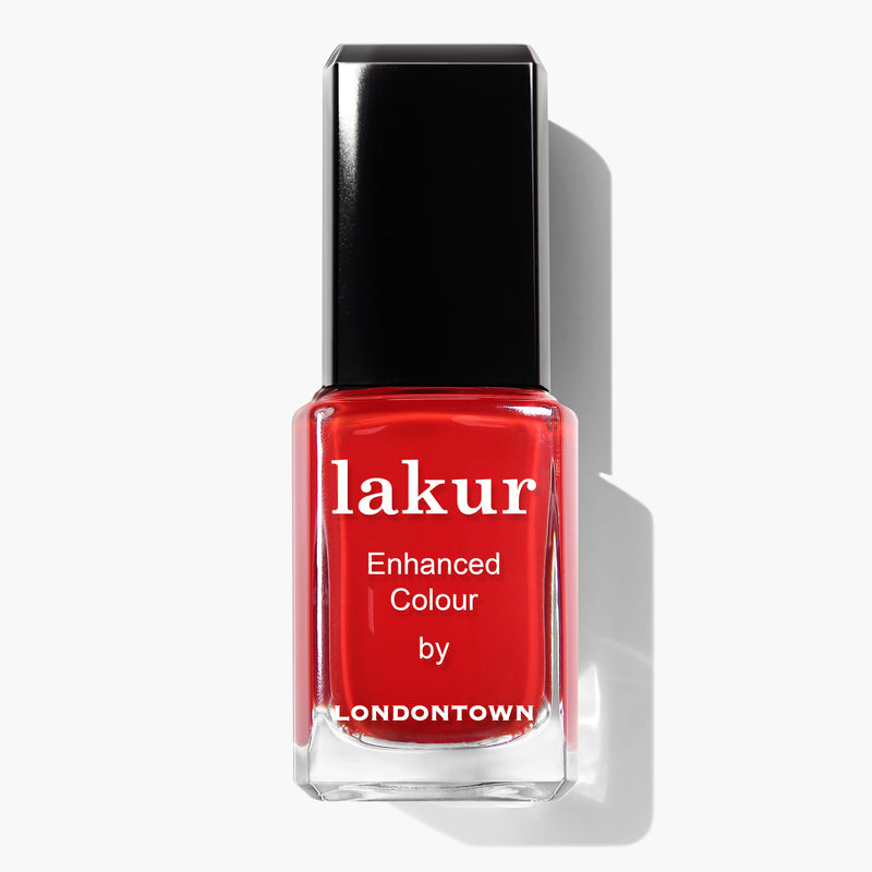 A bottle of red crème polish called "Londoner Love" by LONDONTOWN, with a black cap, boasting a 16+ Free and Cruelty-Free formula.