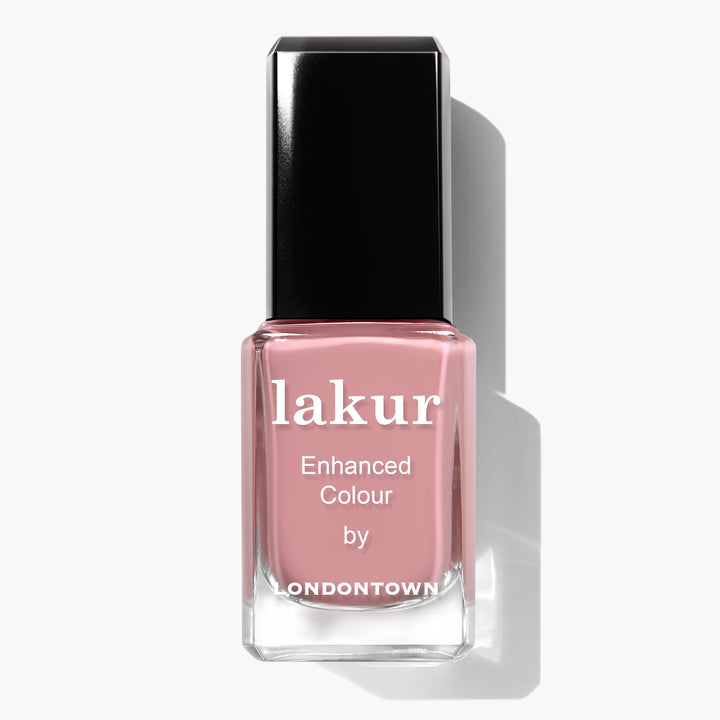 A bottle of LONDONTOWN Lakur Enhanced Colour nail polish in the shade Mauve Over, a soft crème dusty rose hue that is vegan and cruelty-free, shown against a white background.
