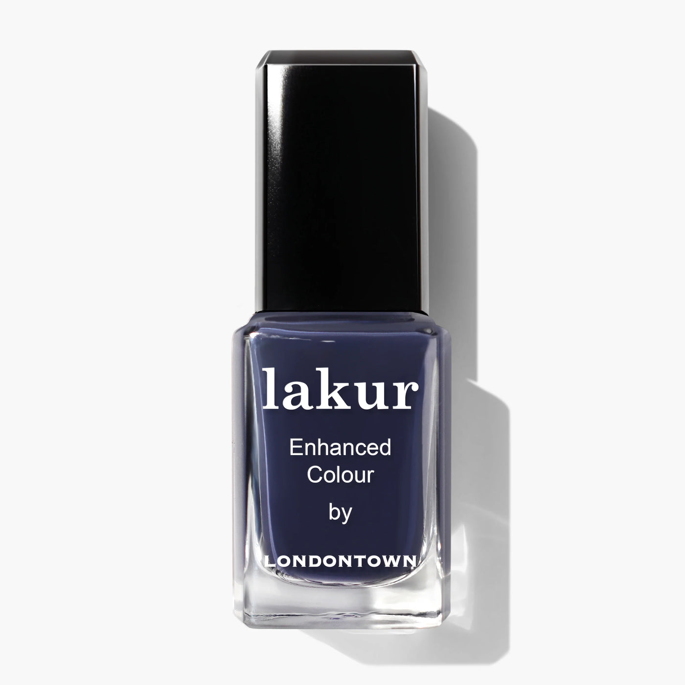 A bottle of deep indigo "Midnight Kiss (Professional)" nail polish by LONDONTOWN with a black cap, viewed from the front.