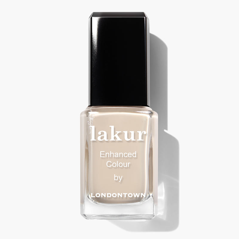 A bottle of Lakur nail polish named "Murray Me," featuring a black cap. The label reads "Lakur Enhanced Colour by LONDONTOWN." The polish boasts a light French vanilla cream color and is proudly vegan and cruelty-free.