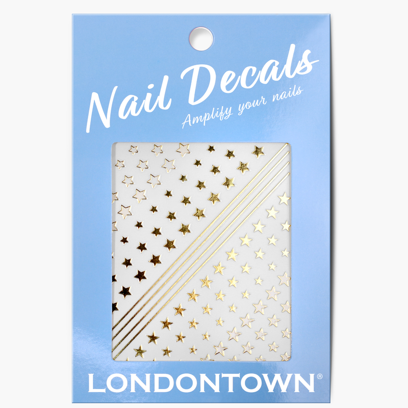 A blue package of LONDONTOWN Nail Decals - Starbright featuring gold star and stripe designs, perfect for easy nail art.