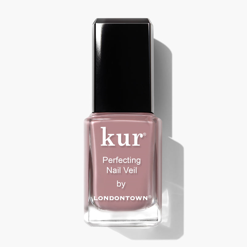 A bottle of LONDONTOWN Perfecting Nail Veil #3 in a vibrant pinkish shade, featuring a black cap, set against a plain white background.
