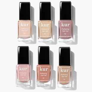 Six bottles of the LONDONTOWN Perfecting Nail Veil Collection, each in a different shade, are arranged in two rows of three against a white background, providing the ultimate care for your nails.