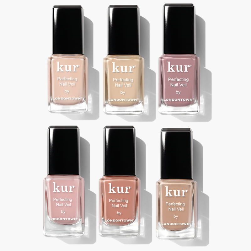 Six bottles of the LONDONTOWN Perfecting Nail Veil Collection, each in a different shade, are arranged in two rows of three against a white background, providing the ultimate care for your nails.