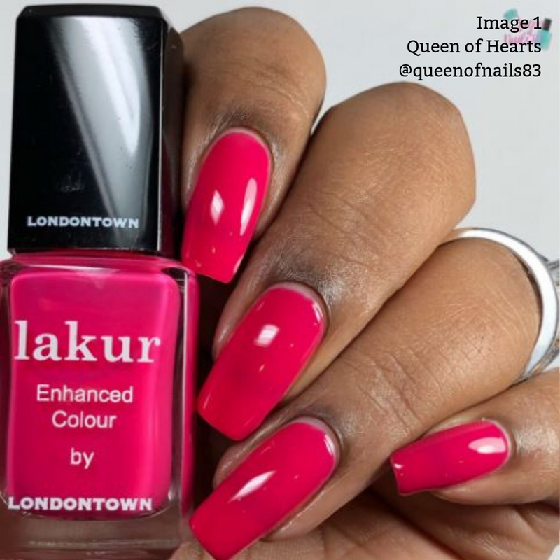 A hand with manicured nails painted bright pink holds a bottle of LONDONTOWN Queen of Hearts Lakur Enhanced Colour nail polish, showcasing its deep fuchsia pink crème shade. The vegan, cruelty-free formula ensures your nails look stunning and guilt-free.