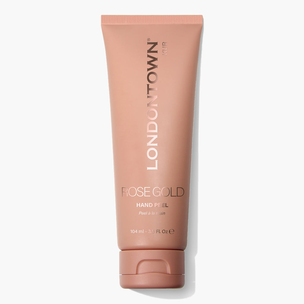 A 104ml tube of LONDONTOWN's Rose Gold Hand Peel featuring a pinkish-brown cap and label. The packaging displays the text 