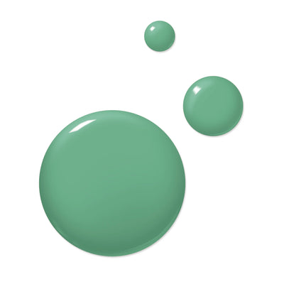 Three splatters of varying sizes in tropical green crème paint on a white background highlight the vibrant beauty of cruelty-free artistry, courtesy of LONDONTOWN's Tipps Time (Professional).