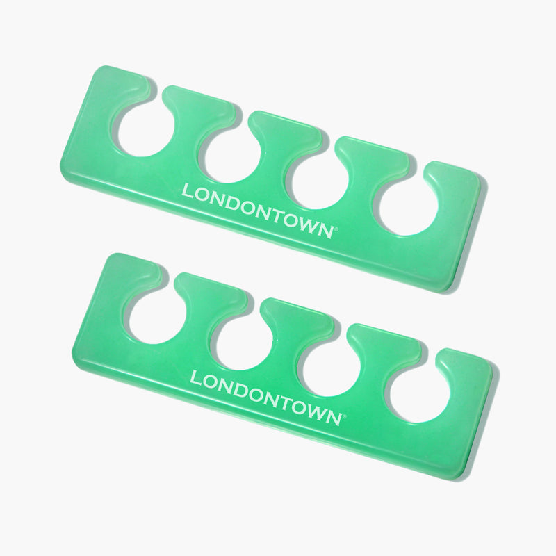 The Jelly Toe Separators from LONDONTOWN, essential for mess-free pedicures, come in green and feature the brand's name printed in white. They are displayed on a white background.