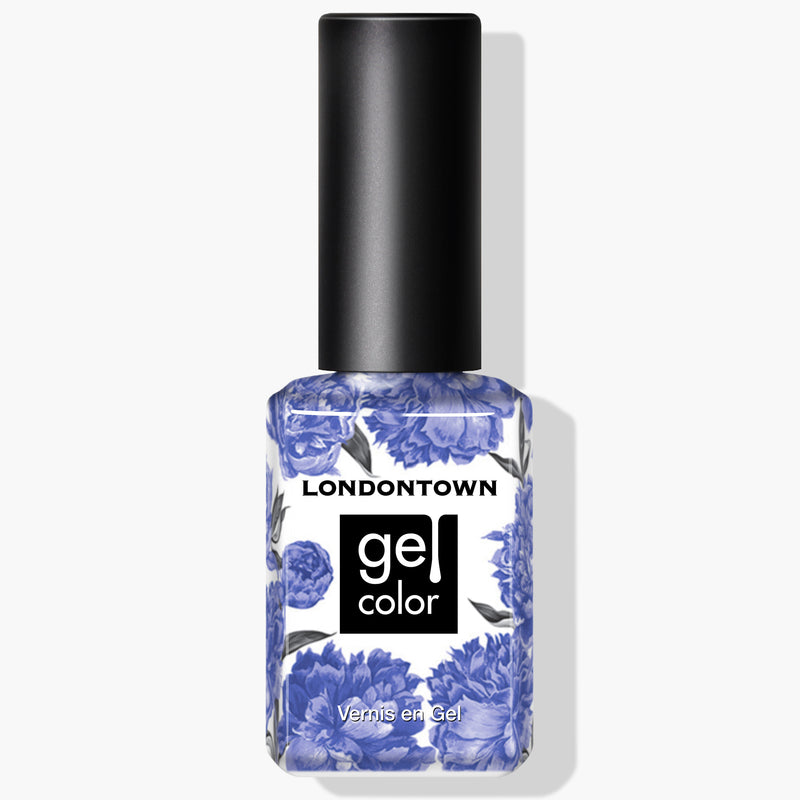 Bottle of LONDONTOWN Uptown Gel Color nail polish with a black cap and a white and blue floral pattern on the bottle, featuring a bold purple shade in UV/LED gel color. This vegan-friendly formula delivers long-lasting shine and durability.